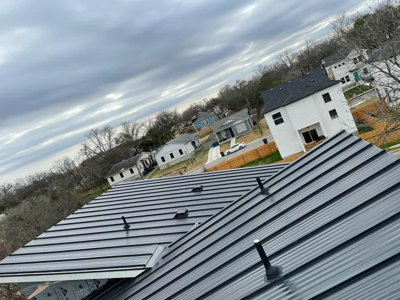 Standing seam metal roof panels with vents for Skylight Repair in Winona Lake